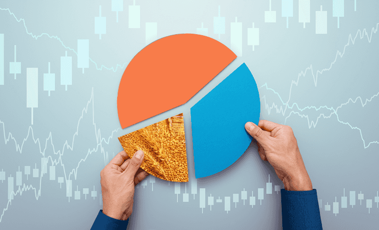 Pie chart with two smaller pieces being held with hands